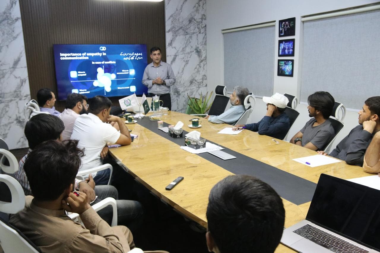 Consultants collaborating around a table in a modern office