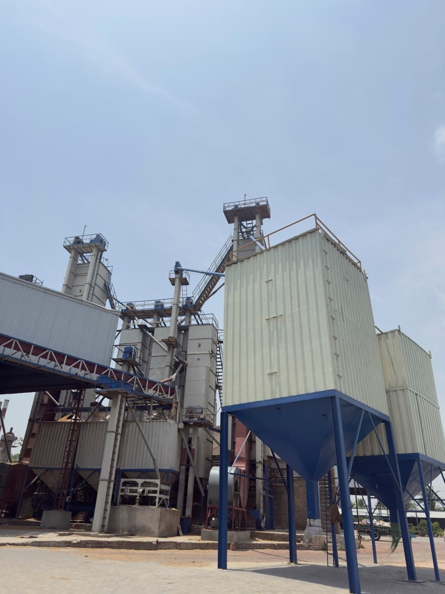 Industrial facility with silos and processing equipment